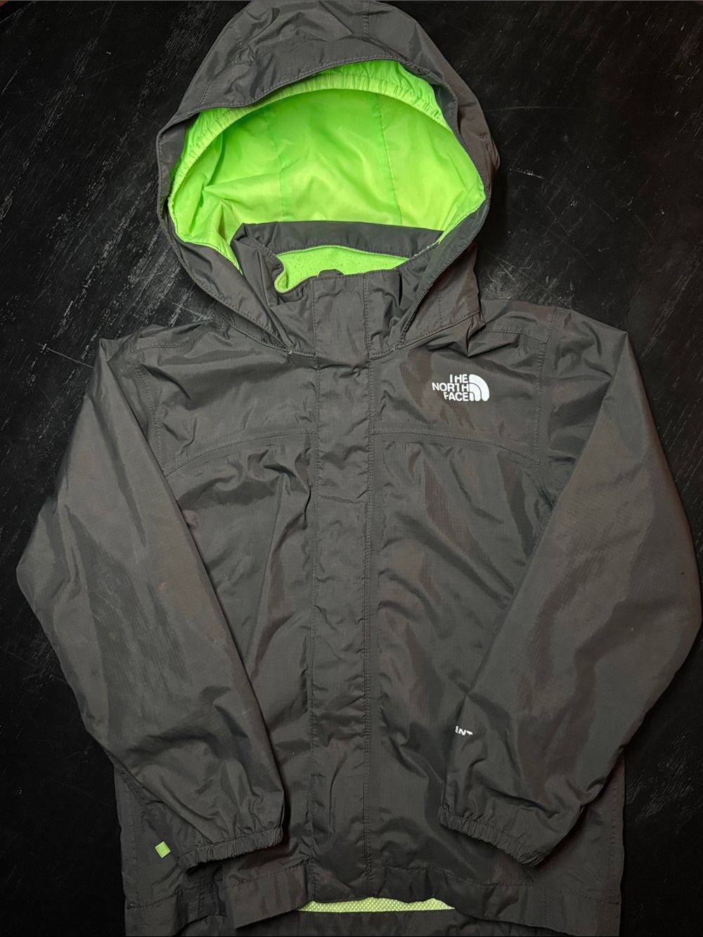 The North Face Kids' Dark Gray Raincoat with Neon Green Lining